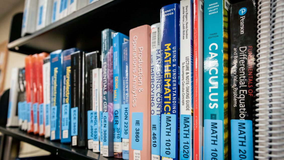 A shelf full of textbooks