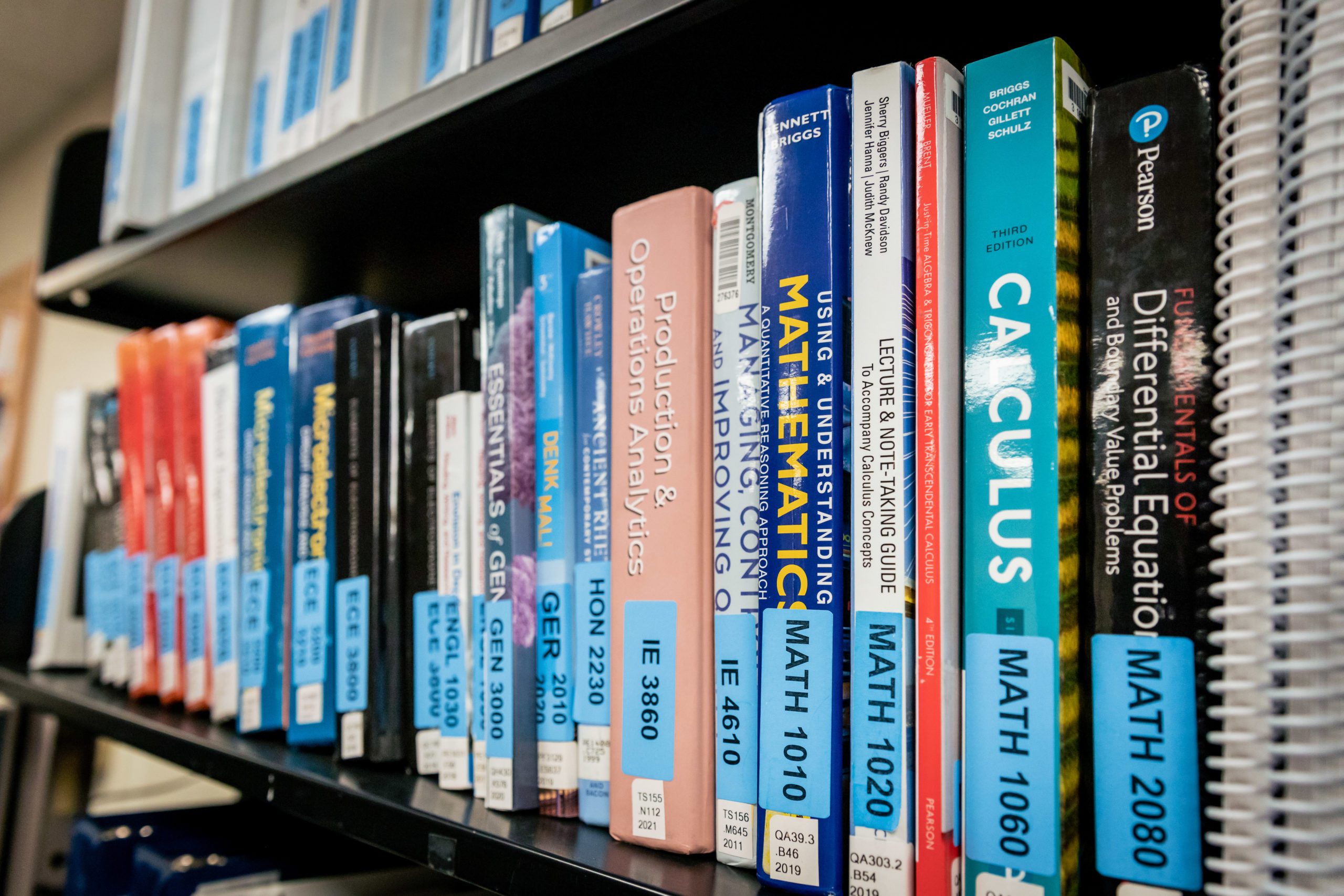 A shelf full of textbooks