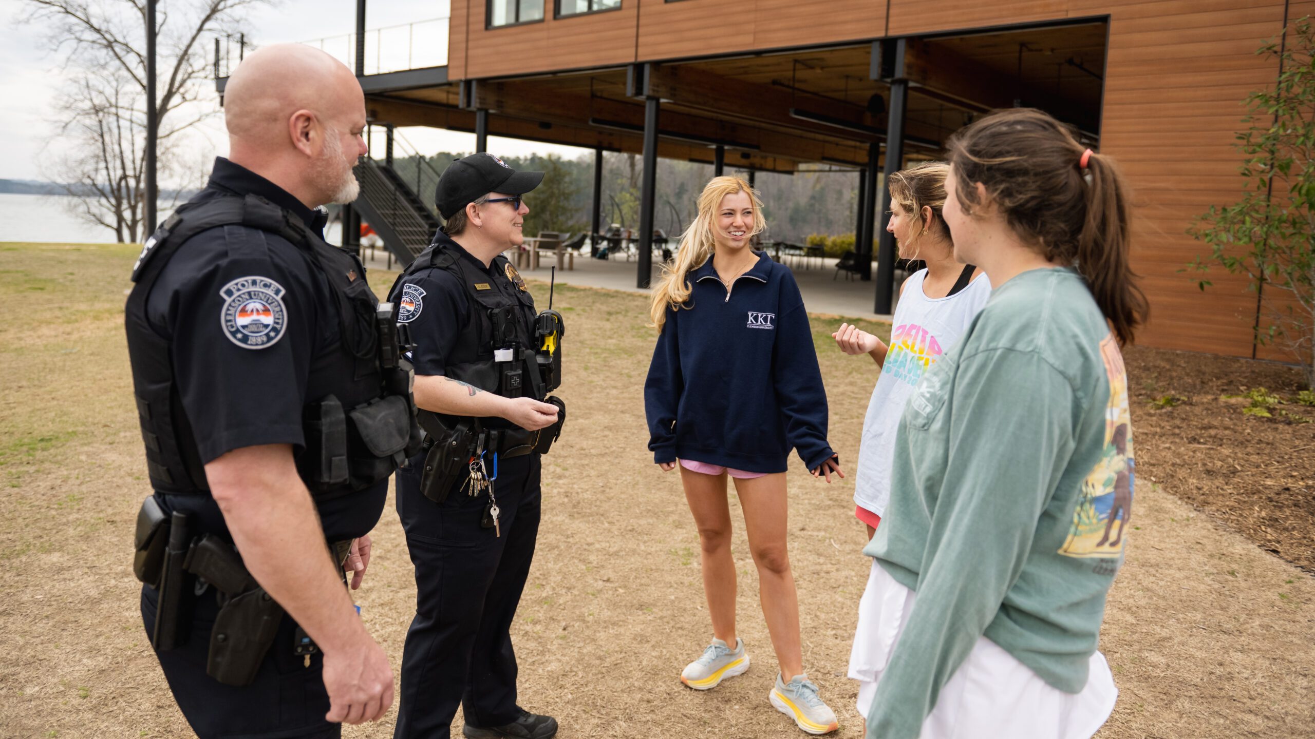 Clemson police officers speaking with three female Clemson students