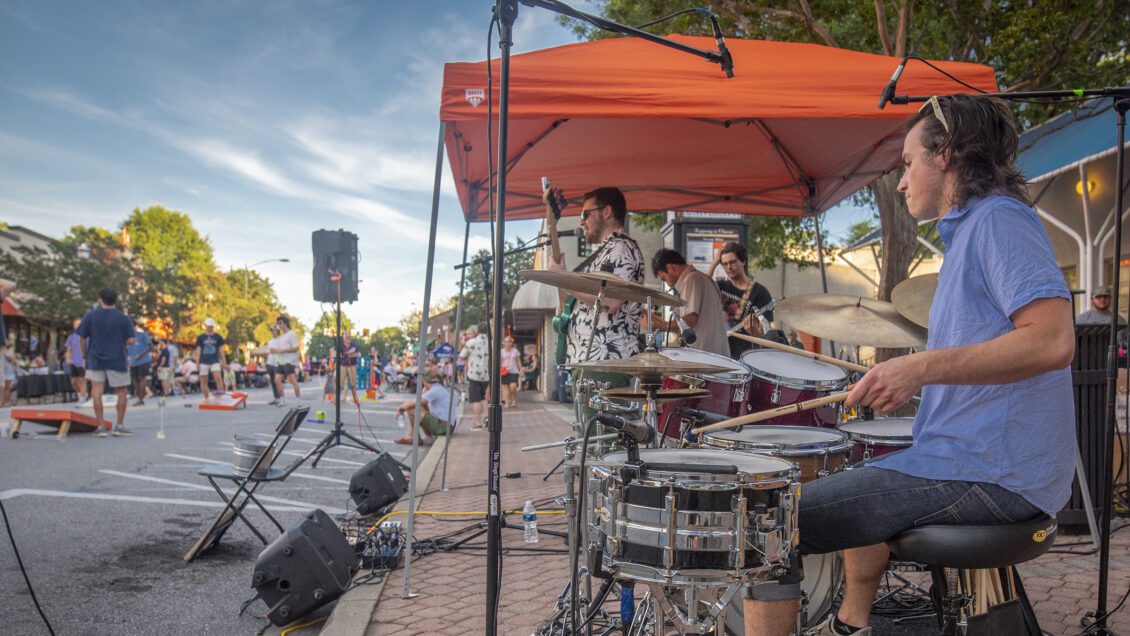 Garrett Arwood and band mates perform during "On the Ave" Summer 2022 concert series in downtown Clemson