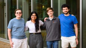 2023 Goldwater Scholars Grant Mondeel, Vaishnavi Kanduri, Joshua Tucker and Giovanni Orlandi posing together in front of the Honors Center on Clemson University campus.