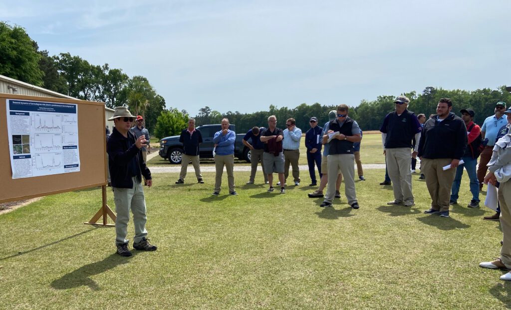 J.C. Chong, Clemson adjunct professor, tells Clemson Turfgrass Field Day participants his research shows the number of witches’ brooms and bermudagrass mite populations tend to increase during spring and early summer.