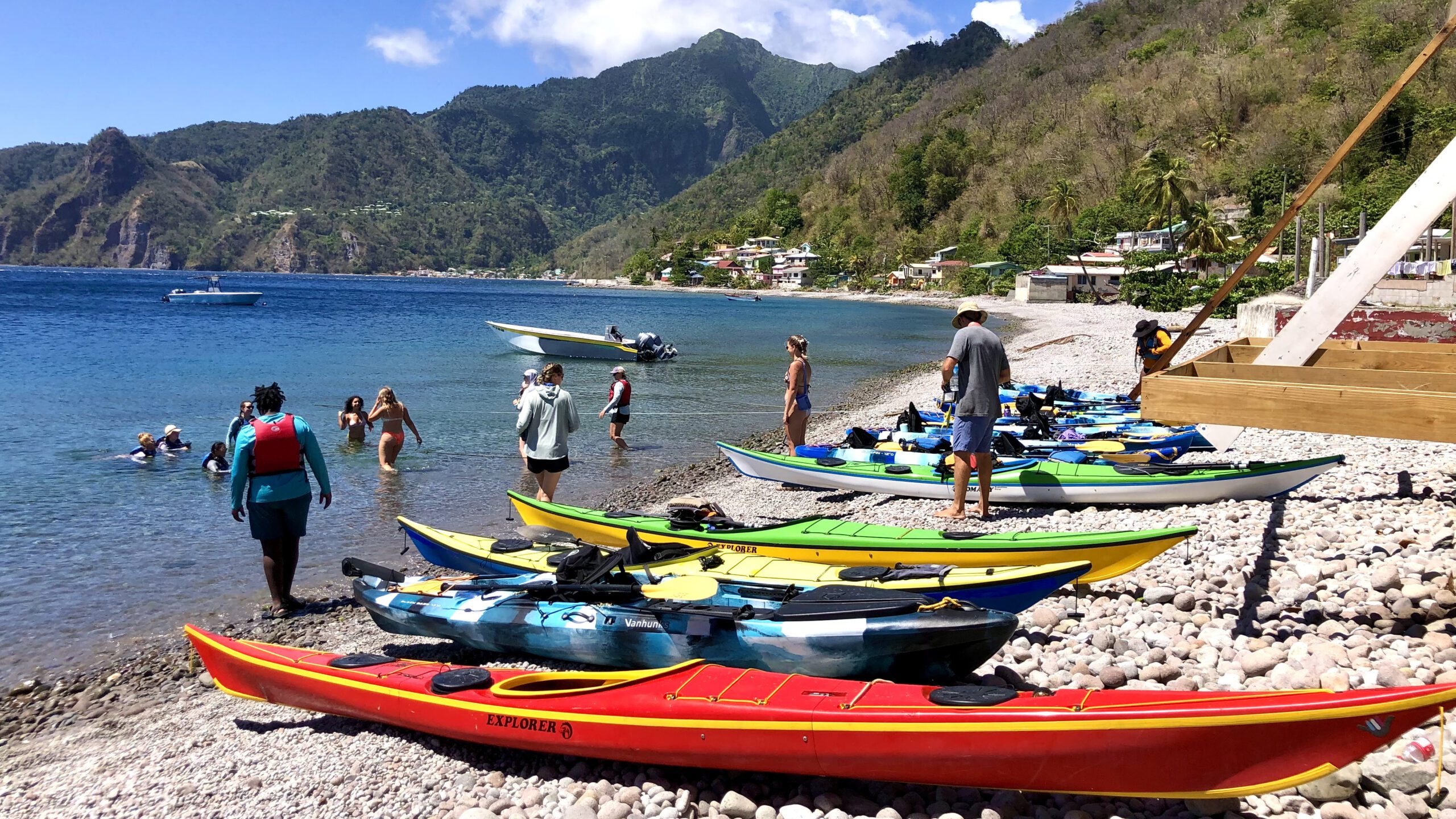 Students and staff enjoy kayaking in the Caribbean during a trip to Dominica in May 2023