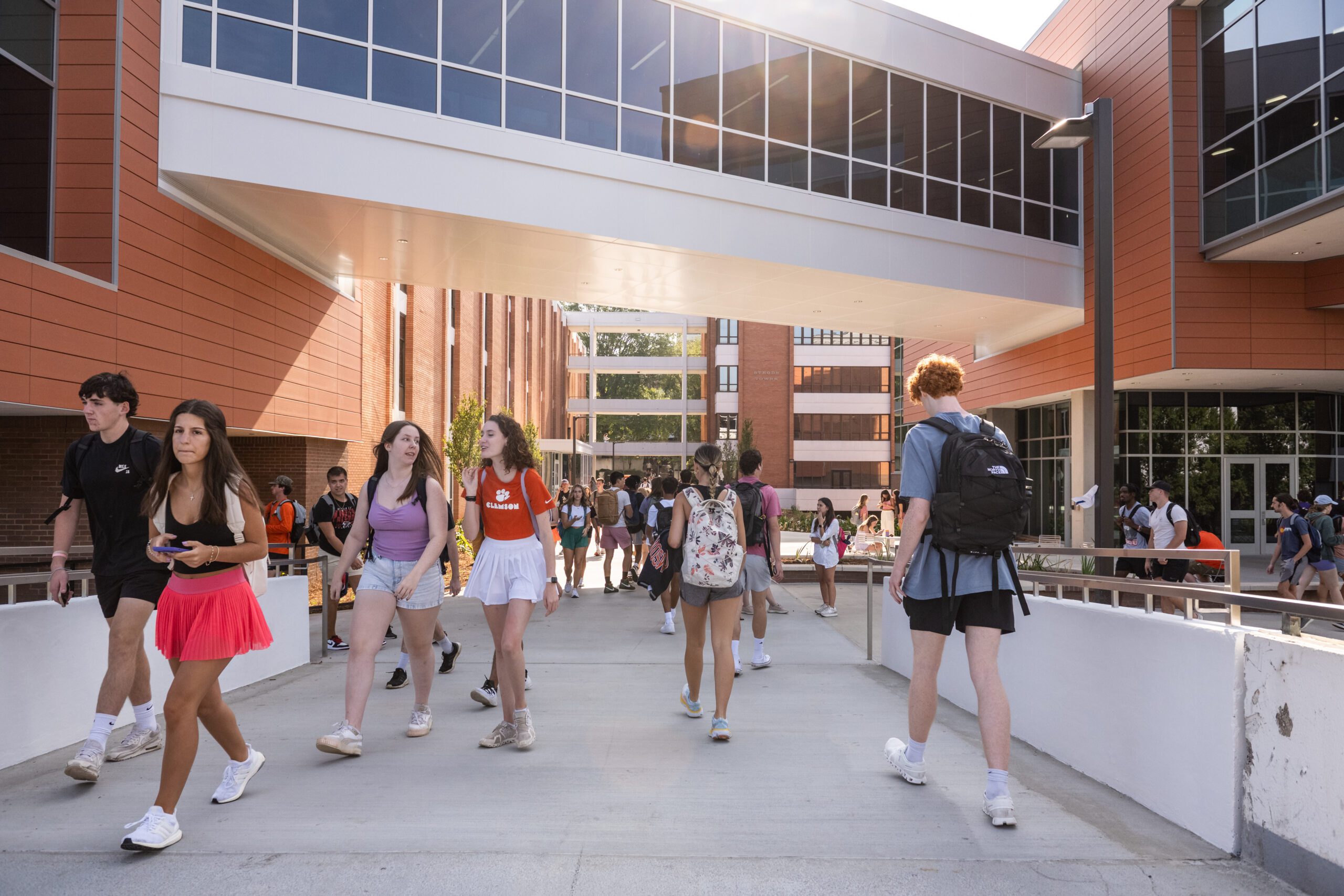 Clemson University students walk past Daniel Hall.