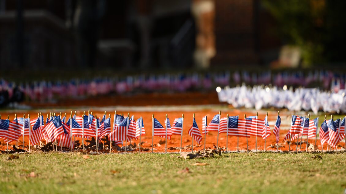 American and military flags on Bowman Field in November 2022