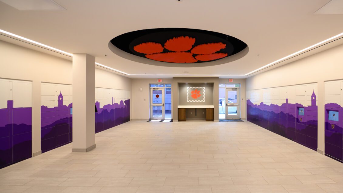 Interior of the new student post office with package lockers and an inset Tiger Paw on the ceiling