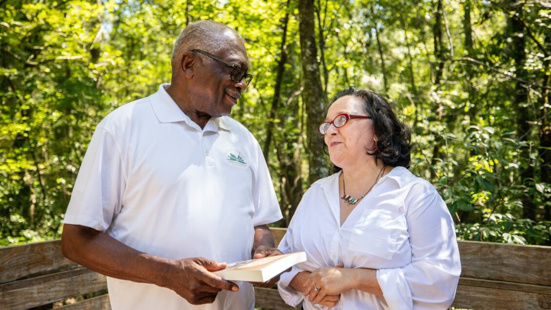 U.S. Congressman James Clyburn and Clemson English Professor Susanna Ashton celebrate the recognition of an Underground Railroad location at Beidler Forest. Photo credit to Gavin McIntyre