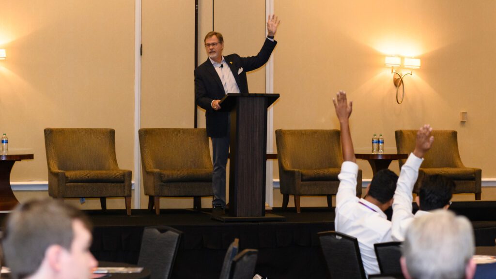 Brad Smith, principal at McMillan Pazdan Smith, engages with the audience during his keynote address at Clemson University's 8th Annual Construction Symposium