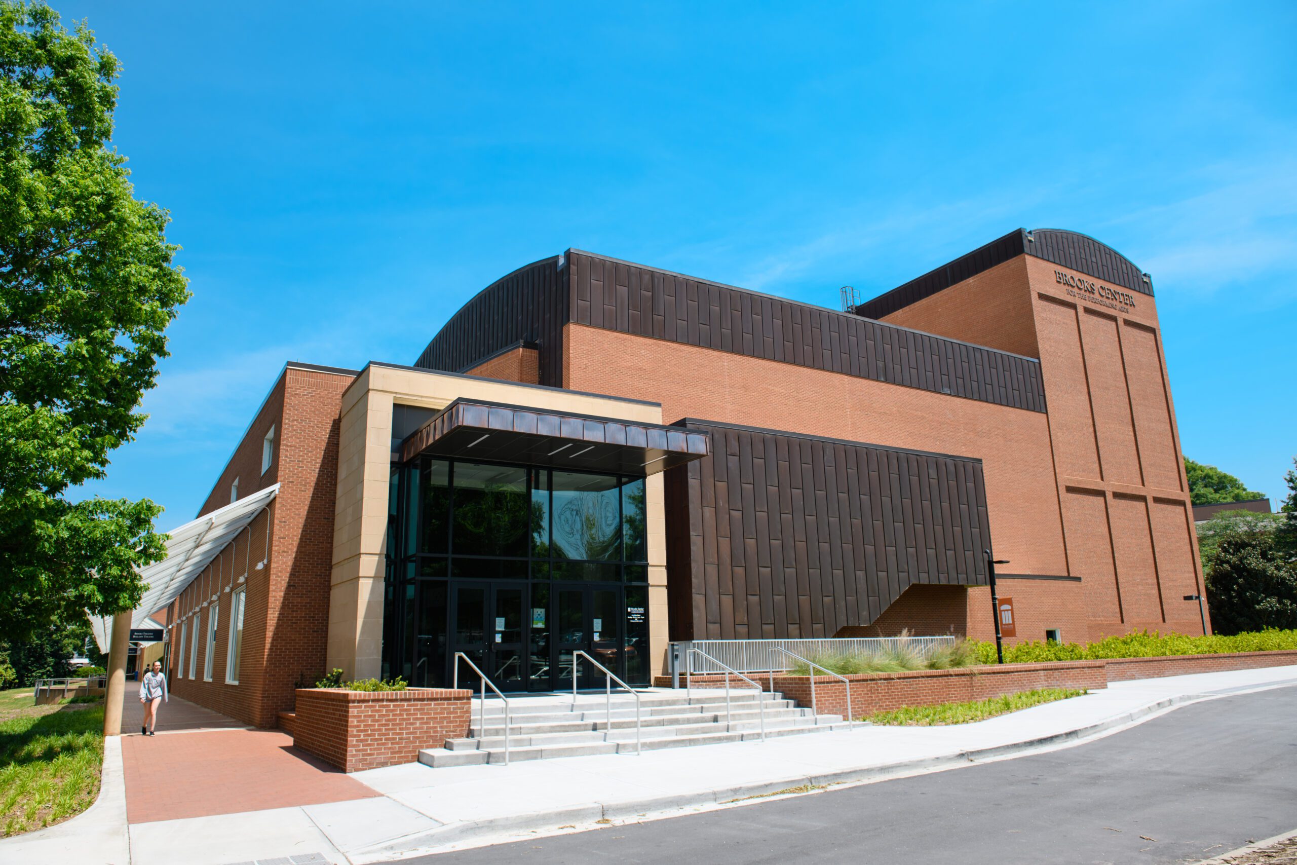 An exterior shot of the Brooks Center for the Performing Arts in the summer.