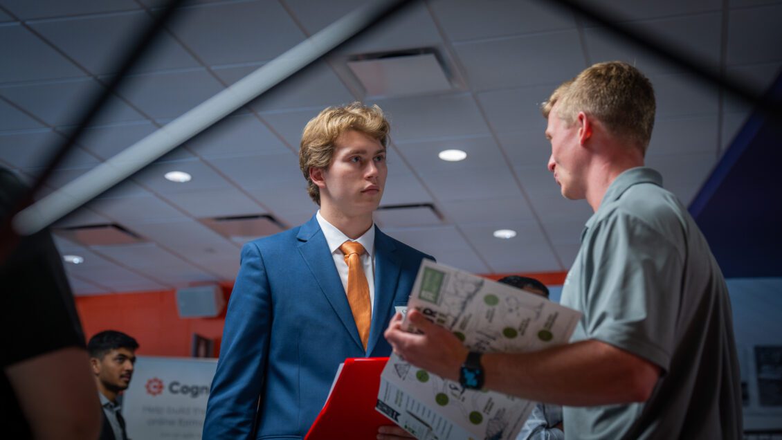 A student meets with a recruiter during the Fall Career Fair