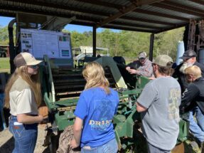 Carrington Knotts, far left, is a high school junior who attended the field day to learn more about technologies used on farms. Knotts' career plans are to become a crop consultant.