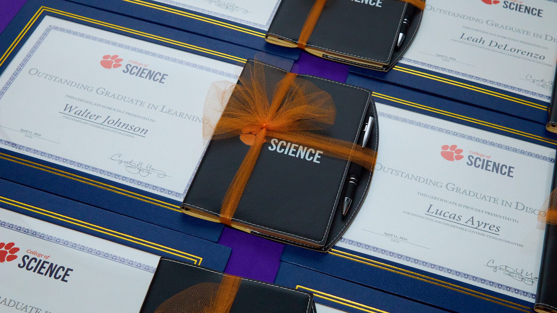A photo of College of Science award certificates