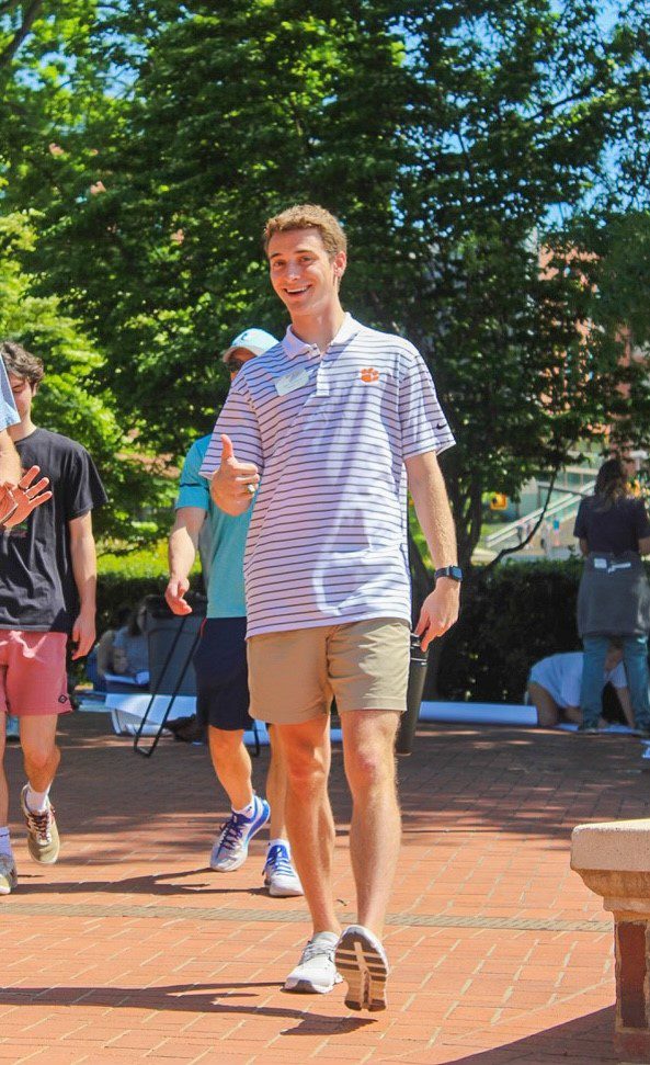 Ben Greene, a Powers College of Business '24 graduate, is a tour guide.