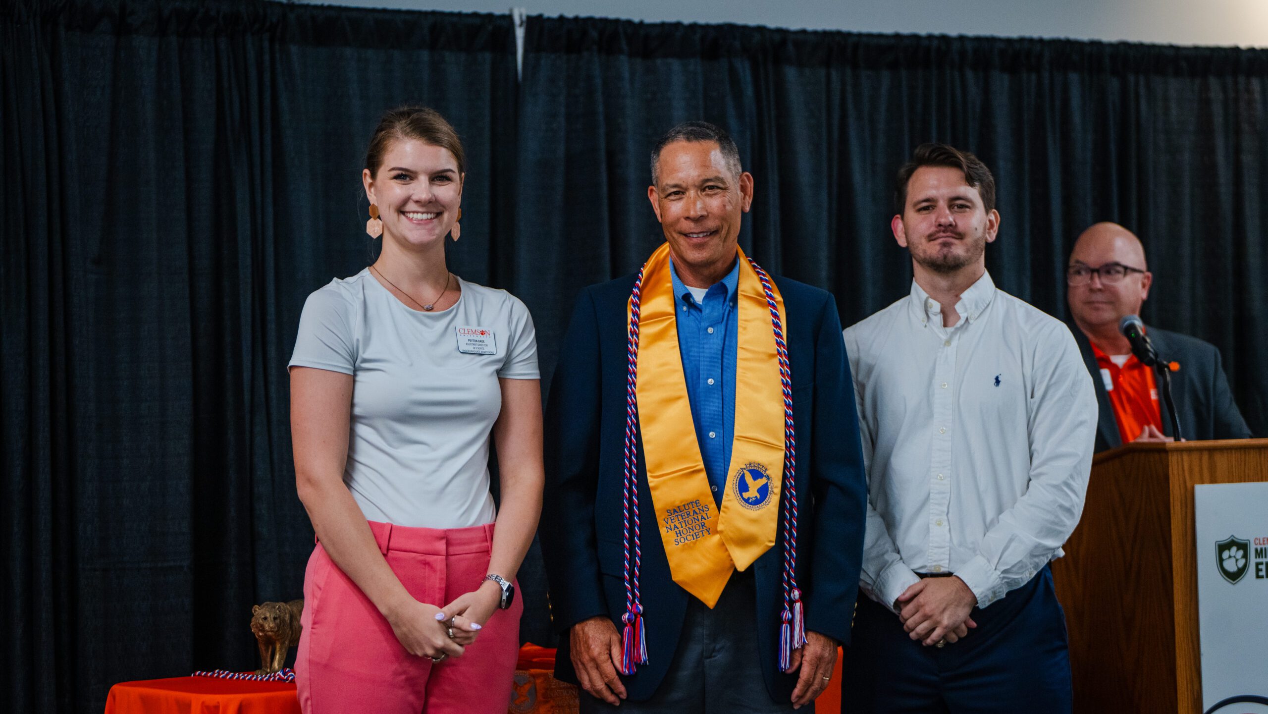 Craig Wells receives his Americana cords and honor stoles as a master's degree candidate and student veteran at the 2024 Service Member Graduation Recognition on Monday, May 6
