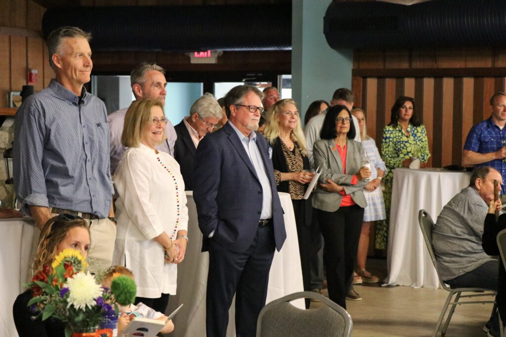 Brett Wright, his wife Judy Wright and Clemson colleagues gather at the Outdoor Lab on April 30