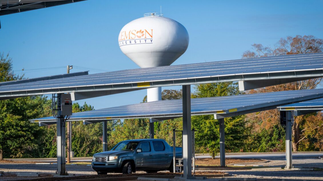 Cars park under 17 large solar canopies in the R-6 parking lot near Clemson Boulevard, Oct. 26, 2023.