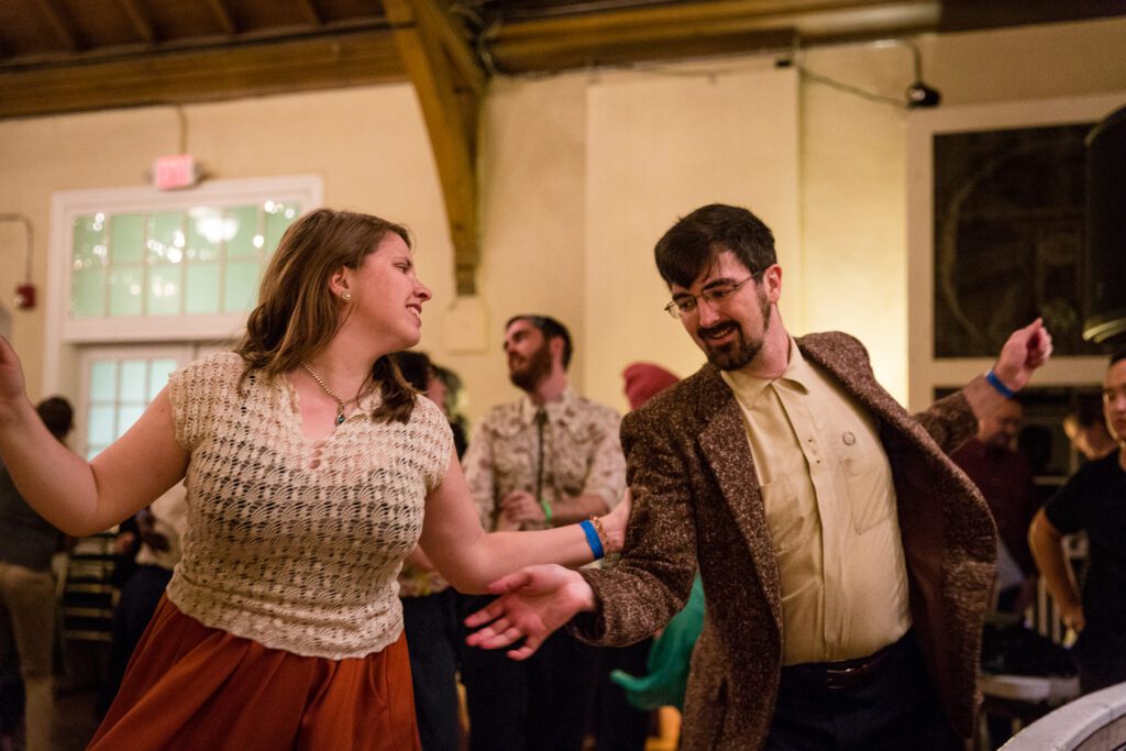 A woman and a man dancing.