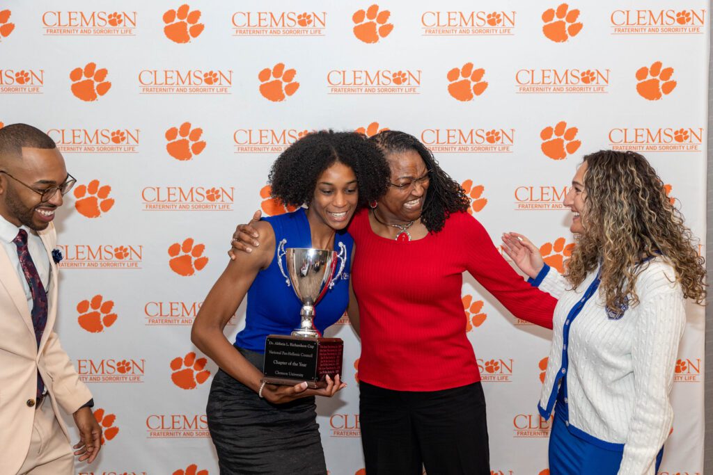 Altheia Richardson awards the NPHC Chapter of the Year award