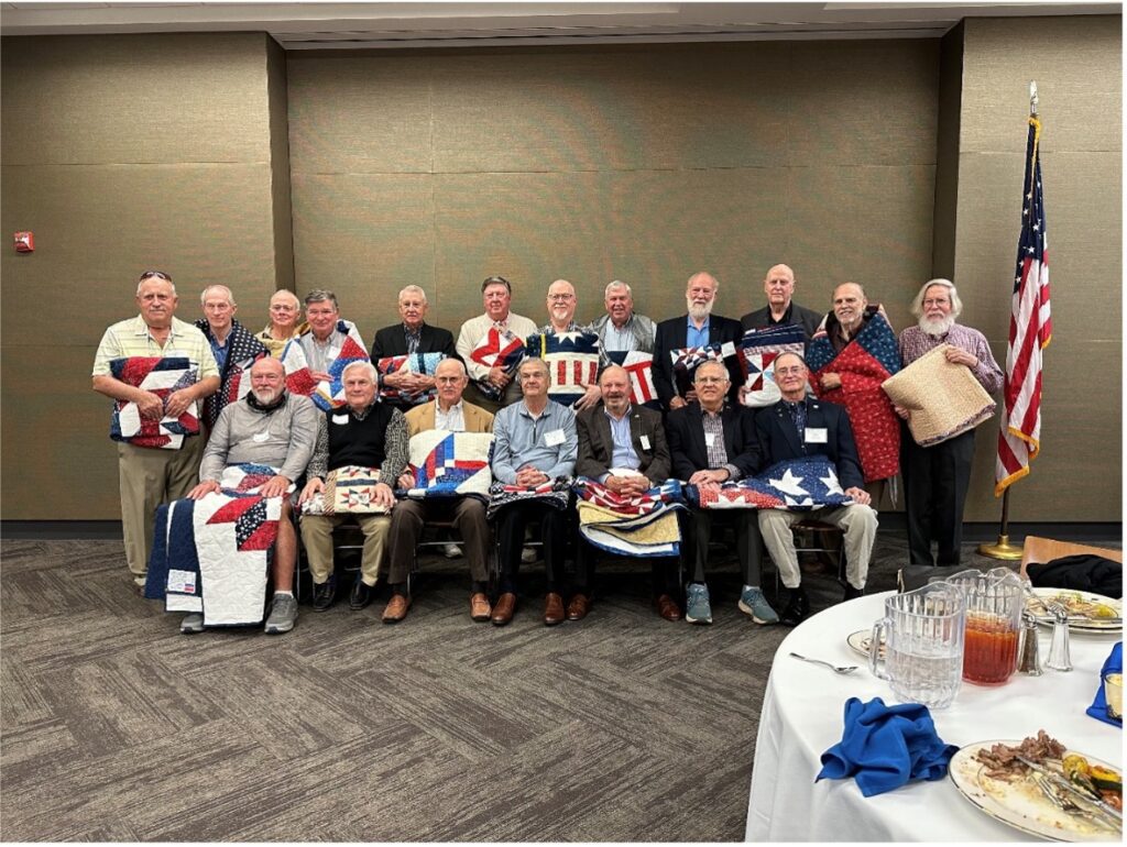 Vicki Gillis awarded her North Georgia College 1968 classmates Quilts of Valor in November 2023 at their 55th reunion.