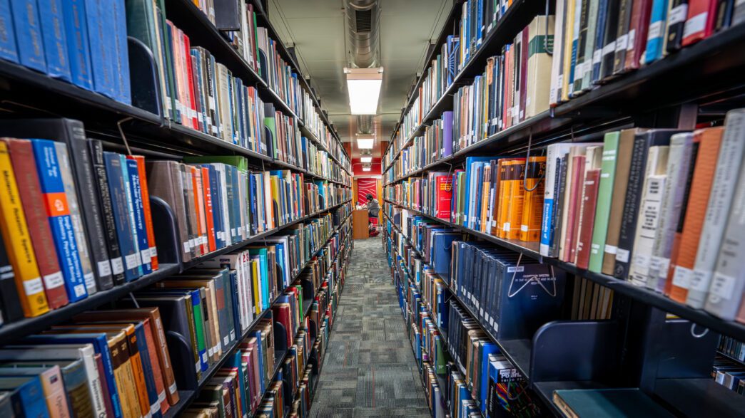 Books on shelves at Cooper Library.