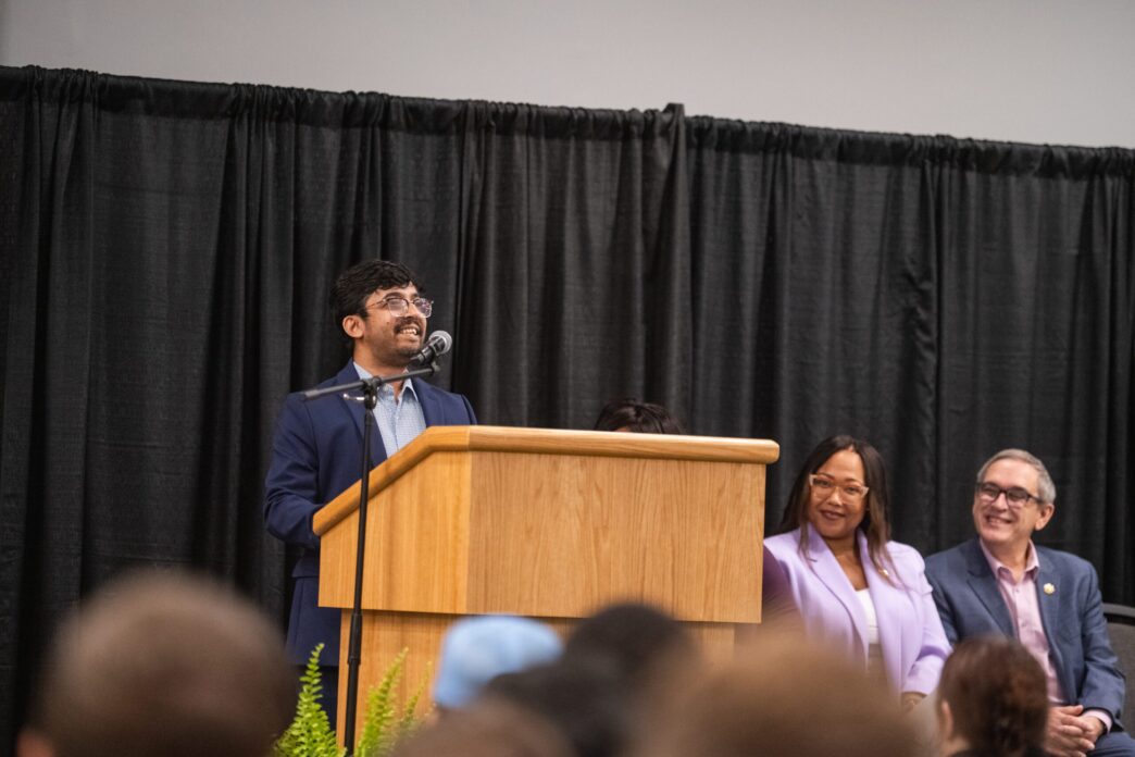 Kazi Rana, president of Graduate Student Government, addresses new students during graduate orientation in August 2025