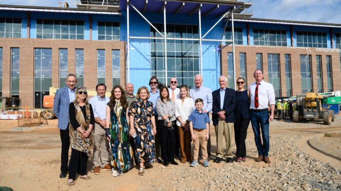 Don Quattlebaum with family and friends in front of the newly named Quattlebaum Hub