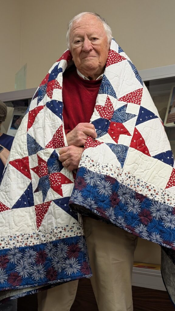 Larry Gillis in his quilt.