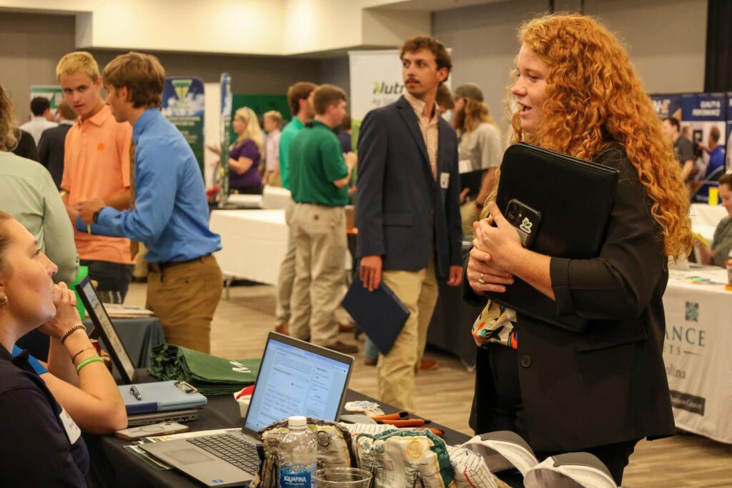 Tabitha Swygert speaks to a recruiter at the CAFLS Career Fair.
