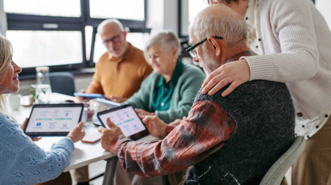 Group of senior people learning digital skills