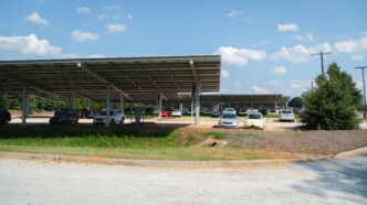 Park-N-Ride parking lot with cars.