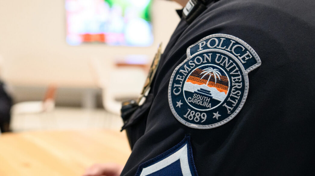 An up close view of a patch on the sleeve of a Clemson University police officer.