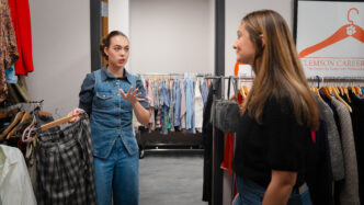 Students sort through professional attire in Clemson's Career Closet