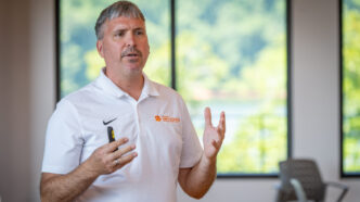 Bill Dunn, Campus Recreation's assistant director of well-being, presents in a well-lit room in the Andy Quattlebaum Outdoor Education Center