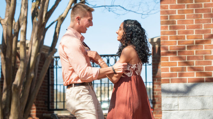 Brady Young and Rosie Hanna embrace after learning election results announcing them as new student body president and vice president