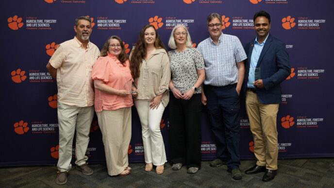 Award winners pose together at the annual CAFLS Awards ceremony
