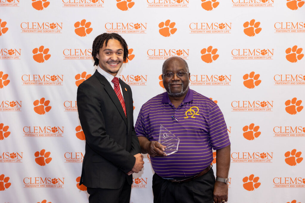 Curtis White, pictured with senior Evan Ricks, at the 2026 Fraternity and Sorority Life Awards Banquet