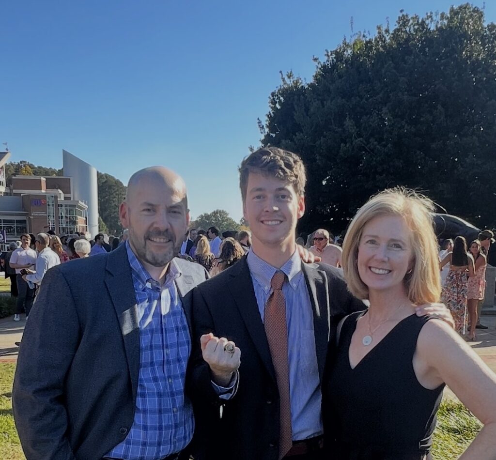 John and parents at Ring Ceremony. 