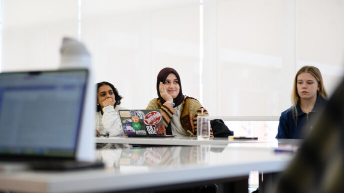 Students listen in class