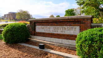 Clemson University brick sign in front of Bowman Field.