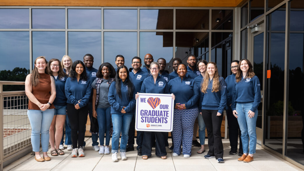 Current members of Clemson University's Accelerate to Industry (A2i) cohort gather outside of the Wilbur O. and Ann Powers College of Business
