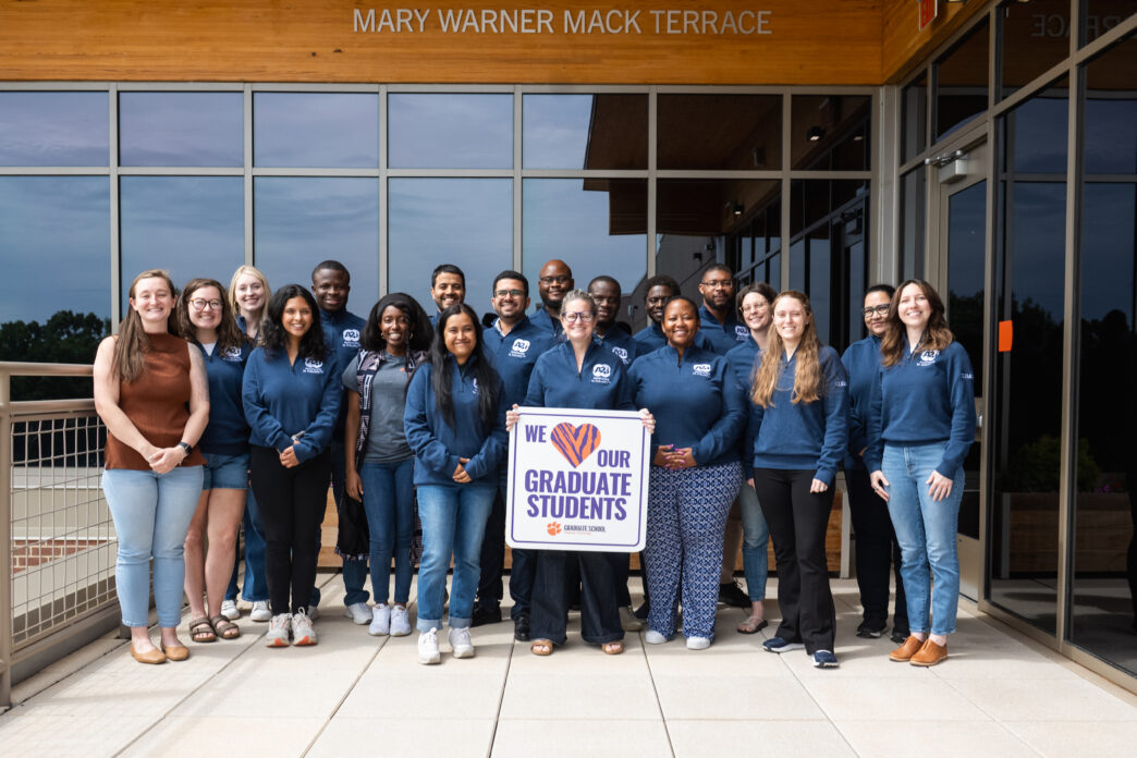 Current members of Clemson University's Accelerate to Industry (A2i) cohort gather outside of the Wilbur O. and Ann Powers College of Business