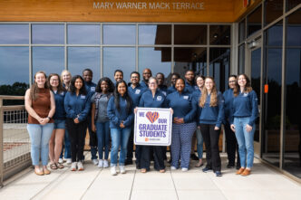 Current members of Clemson University's Accelerate to Industry (A2i) cohort gather outside of the Wilbur O. and Ann Powers College of Business