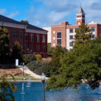 Clemson's reflection pond and campus buildings.