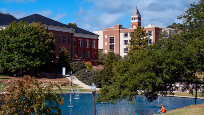 Clemson's reflection pond and campus buildings.