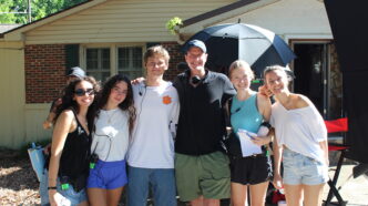 A group people smiling on the set of "The High Note," a Clemson World Cinema film