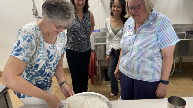 Members of the winning team, ¡Que chiba!, mix their ice cream recipe as part of the Clemson Ice Cream Innovation Experience.