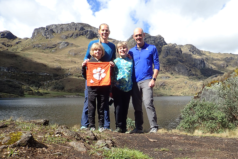 The Caterino family in front of a large Kapok tree, Cuyabeno Wildlife Reserve, Sucumbíos Province, Ecuador.
