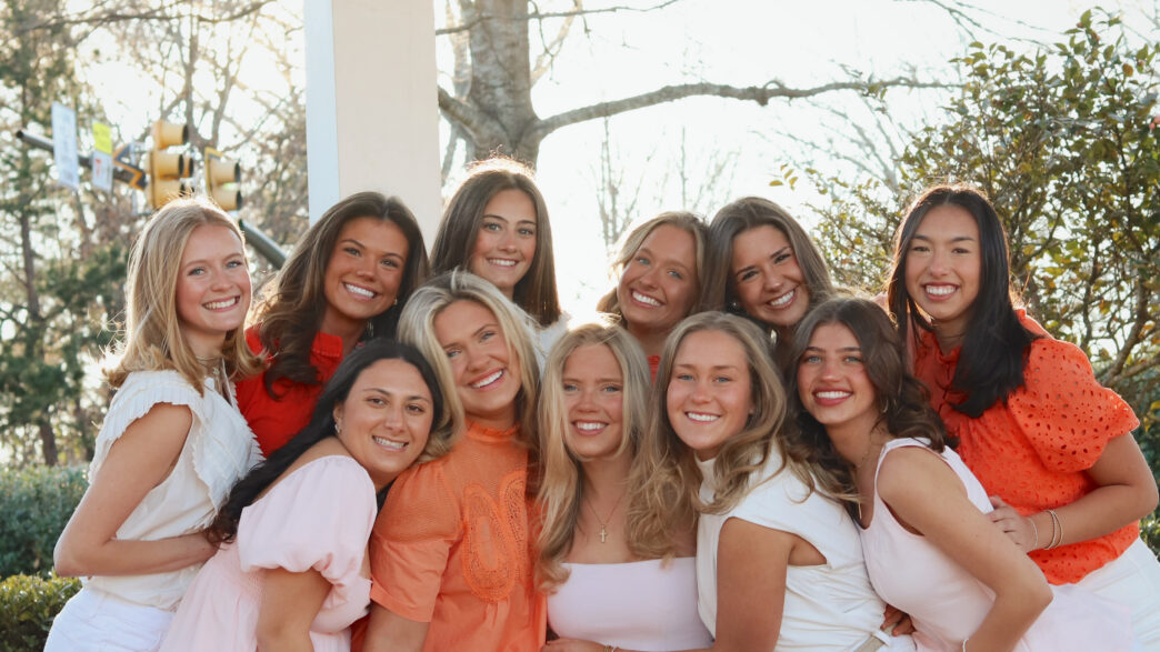 Females pose together for a photo