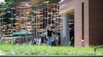 A student navigates main campus at Clemson University