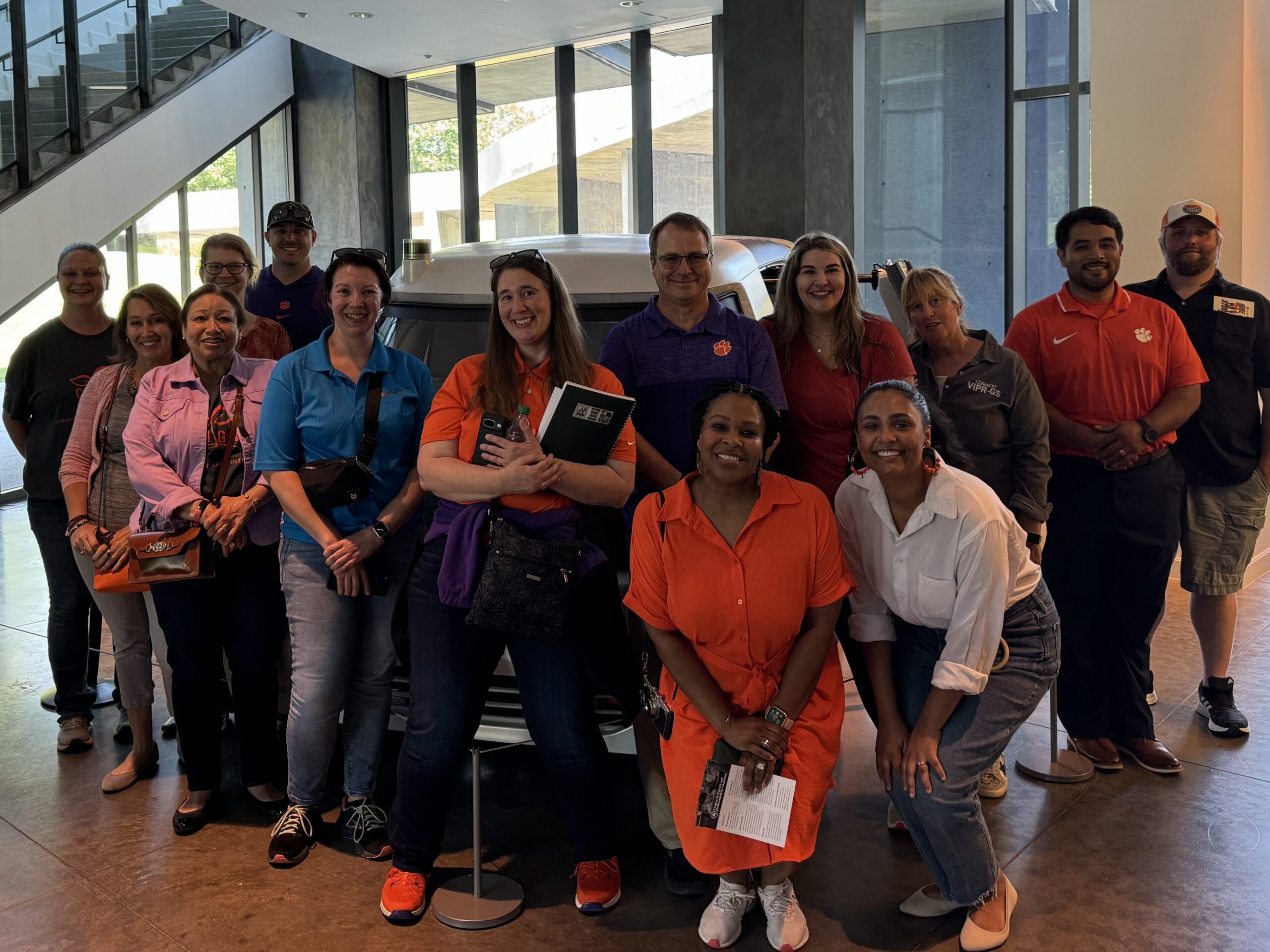A group of Clemson staff members poses for a photo at CU-ICAR.